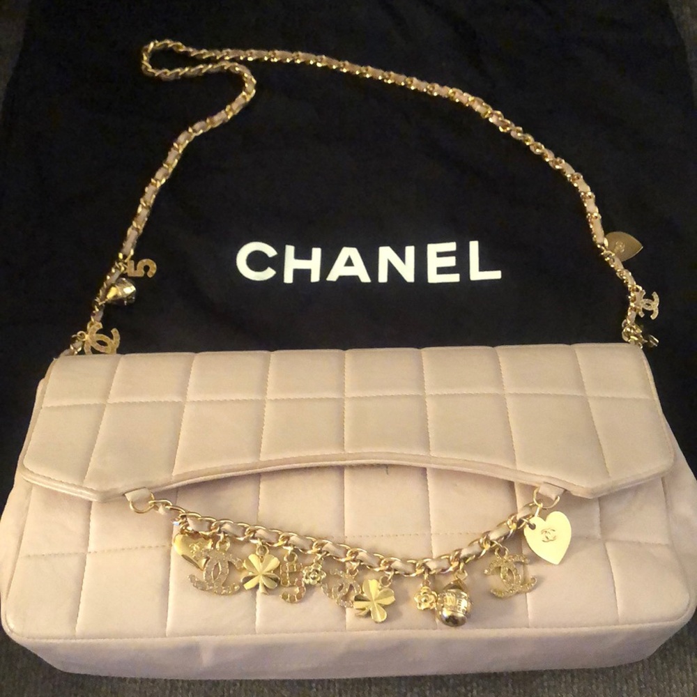 Chanel authentic pink Chanel pocketbook w/gold.  Slip cover and box